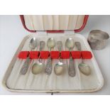 Cased set of six Chinese silver teaspoons with cast dragon handles; together with a Chinese silver