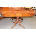 Regency mahogany cross banded card table, the swivel top over ring turned pedestal with four