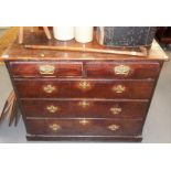 Victorian stained pine chest of two short over three long graduated drawers upon a plinth base,