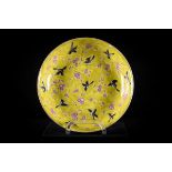 Dish in Chinese porcelain with yellow glaze 'birds' (marked) (18x4cm)