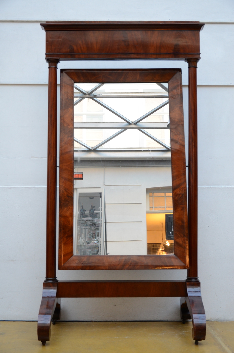 A large Empire mirror in mahogany (114x220cm)