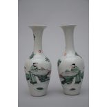 A pair of vases in Chinese famille verte porcelain 'figures' (25cm)