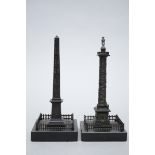 Two bronze obelisks (*) (20cm)