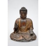A Japanese buddha in laquered wood, Edo period (20x24x29cm)