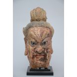 Head in clay of a Chinese temple guard (34cm)