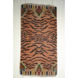 Tibetan tiger rug on orange ground (92x190cm)