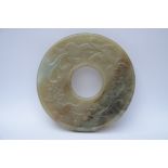 Jade bi disk 'dragons', Ming dynasty (10cm)