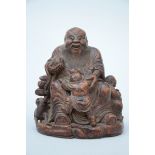 A bambou sculpture 'Laotsé with playing children' (15cm)