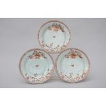 Three dishes in Chinese porcelain 'butterfly', 18th century (*) (23cm)