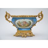 A large bowl in Sèvres porcelain with gilt bronze mounts (32x55x35cm)