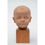 Geo Verbanck: head in terracotta 'son of the artist' (18cm)
