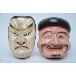 Lot: two Japanese masks 'man with hat' and 'man with big nose' (15x22cm)