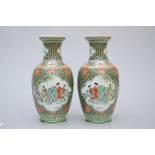 Pair of vases in Chinese porcelain 'ladies in a garden', 20th century (*) (37cm)