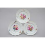 Three dishes in German porcelain 'flowers' (24cm)