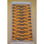 A Tibetan tiger rug with yellow background (93x180cm)