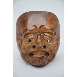 A japanese wooden mask (15x18cm)