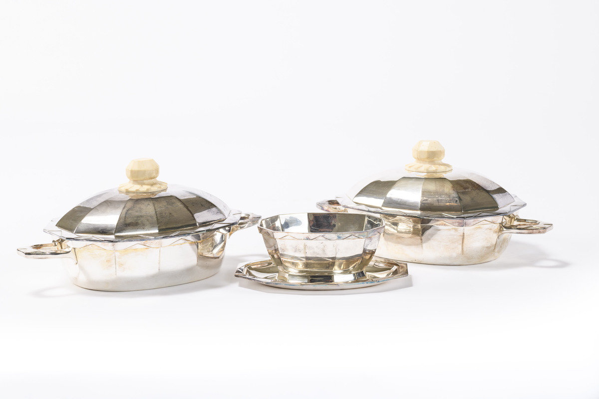 A pair of Art Deco legumiers and a sauce bowl in silver with ivory handles by Wolfers, model '