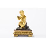 'Flute player' in gilt bronze on a wooden base (32cm)