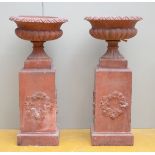 A pair of terra cotta garden vases, 19th century (*) (50x112cm)