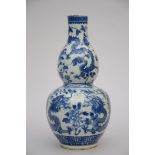 A double gourd vase in Chinese blue and white porcelain 'dragons' (46cm)