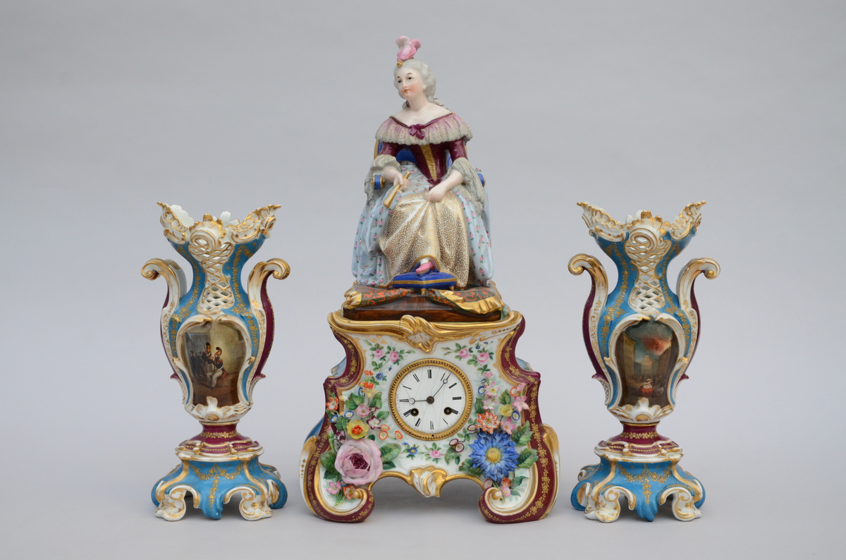 A three-piece porcelain clock set 'lady on a throne' (56cm)