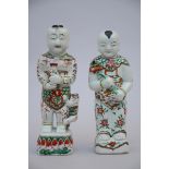 A pair of hÈhÈ statues in Chinese porcelain, Kangxi period (*) (33cm)