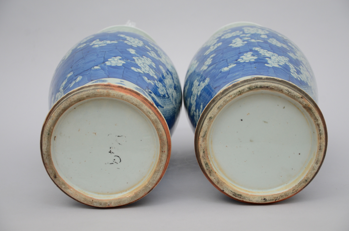 A pair of Chinese vases in blue and white porcelain 'prunus blossoms' (*) (59cm) - Image 3 of 4
