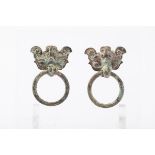 A pair of Chinese Archaic ornaments in bronze 'Taotie masks' (7x11cm)