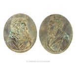 A pair of cast metal neoclassical roundels " Paulus & Petrus"