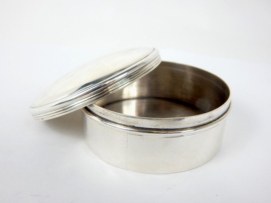 A Victorian Sterling Silver Circular Box and Cover.