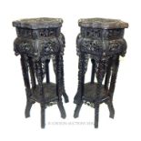 A pair of carved wood Chinese export jardiniere stands