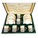 A Copeland Spode China Tea Set for six with Sterling Silver Mounts.