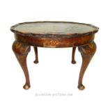 A small round Chinoiserie coffee/side table circa 1930