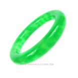 A Chinese green jade bangle