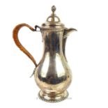 A George III Sterling Silver Hot water Jug.