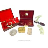 A miscellaneous assortment of items including jewellery and items of jade.