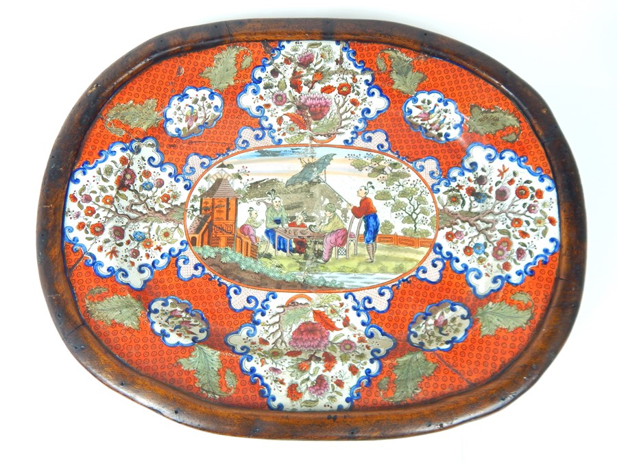 A 19th Century ceramic meat platter decorated with oriental figures (damaged in several places) moun