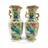 A pair of Chinese celadon famille rose porcelain vases.