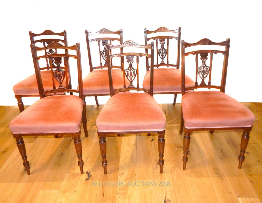 A set of six chairs.