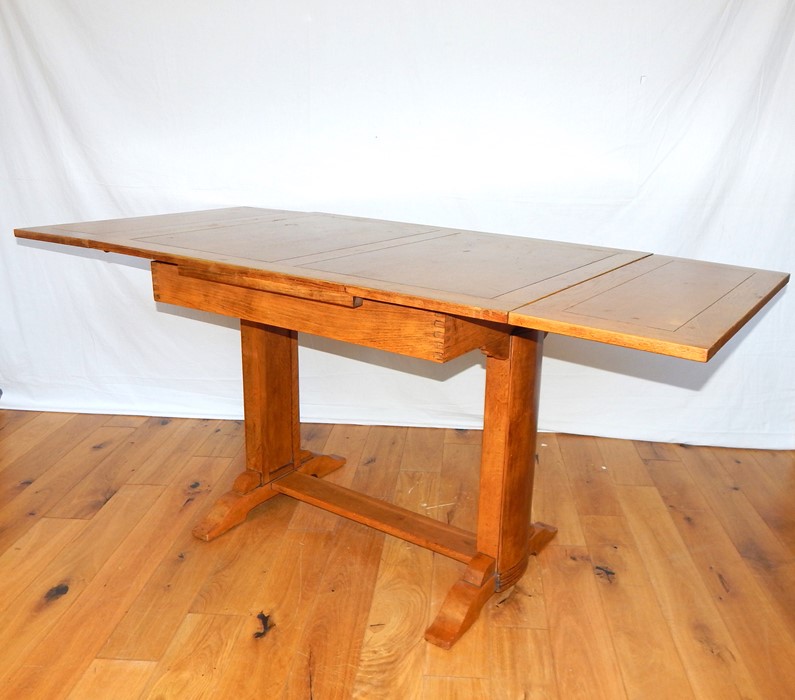 A two leaf oak extending table. - Image 2 of 2