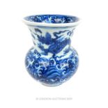 A Chinese Dragon Decorated Blue & White Porcelain Vase With Seal Mark To Base.
