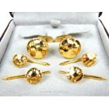 A Boxed Set of Yellow Metal Marked 750 Cuff links and Four Shirt Studs.