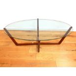 A Glass top coffee table.