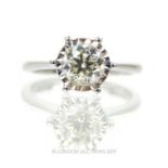 An 18 Carat White gold diamond solitaire ring.