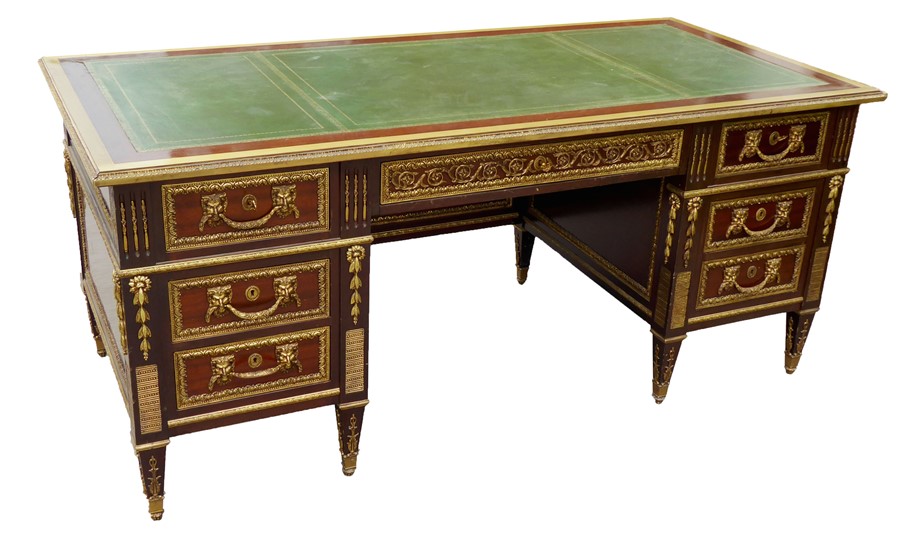 MANNER OF GUILLAUME BENNEMA FRENCH ORMOLU MOUNTED MAHOGANY BUREAU-A-CAISSONS.