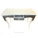 A silver console table