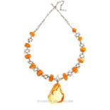 A Baltic Amber and White Metal Necklace