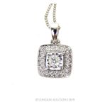 An 18 carat White Gold Diamond set pendant necklace.