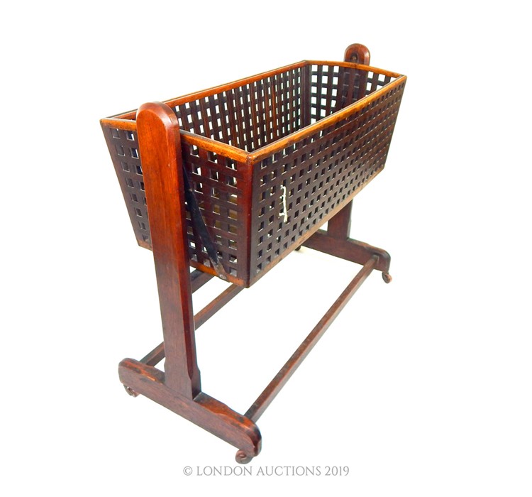 An Antique Mahogany Childs Crib