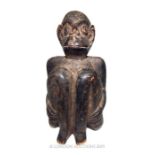 A LATE 19TH/EARLY 20TH CENTURY CARVED WOOD FIGURATIVE TRIBAL MODEL.